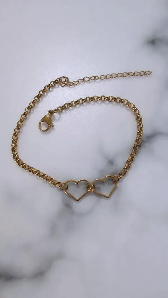 Pulsera dos corazones Acero dorado